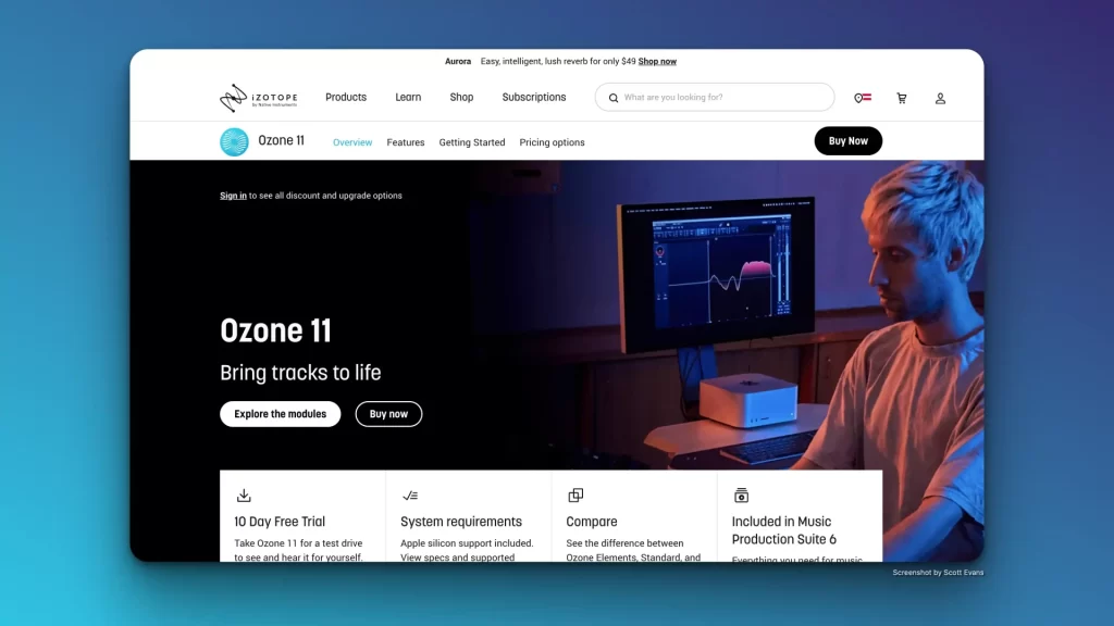 A person with headphones sits at a desk, focused on a computer displaying audio software. The screen shows a waveform graph alongside the innovative AI Audio Plugins. The website header reads "Ozone 11: Bring Tracks to Life," with menu options and product information clearly visible.